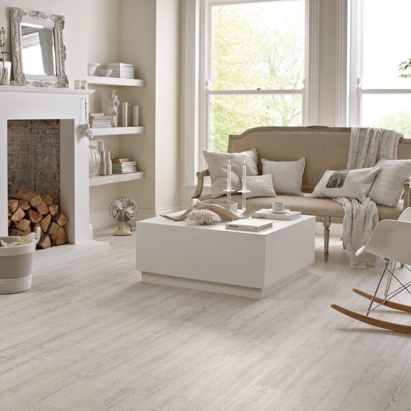 Lounge floor covered with white painted oak effect vinyl planks from Karndean
