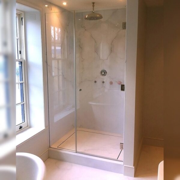 Framless recess shower door with fixed glass closing panel by Room H2o