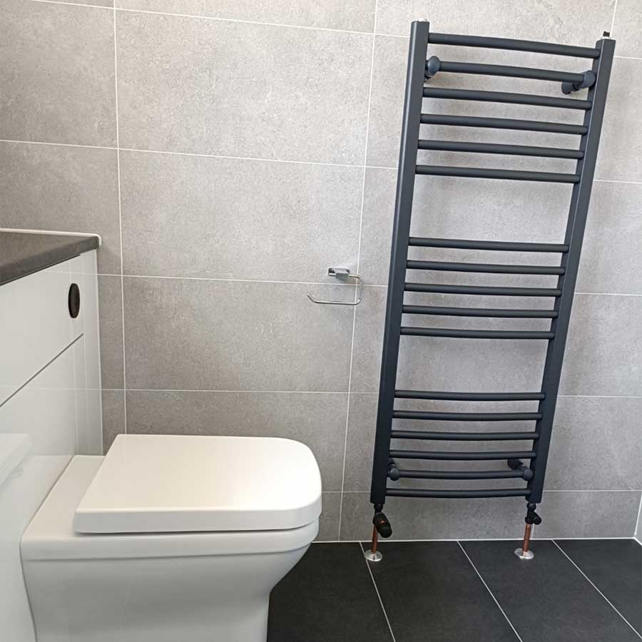 Black Bathrooms To Love curved towel radiator 1200x500mm