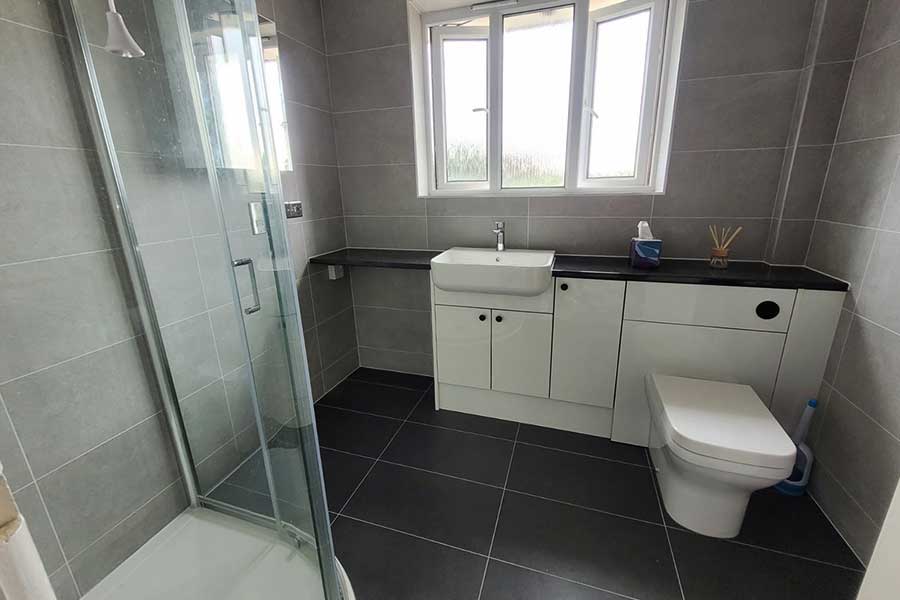 New fully tiled shower room installed in Carey Dorset by Room H2o