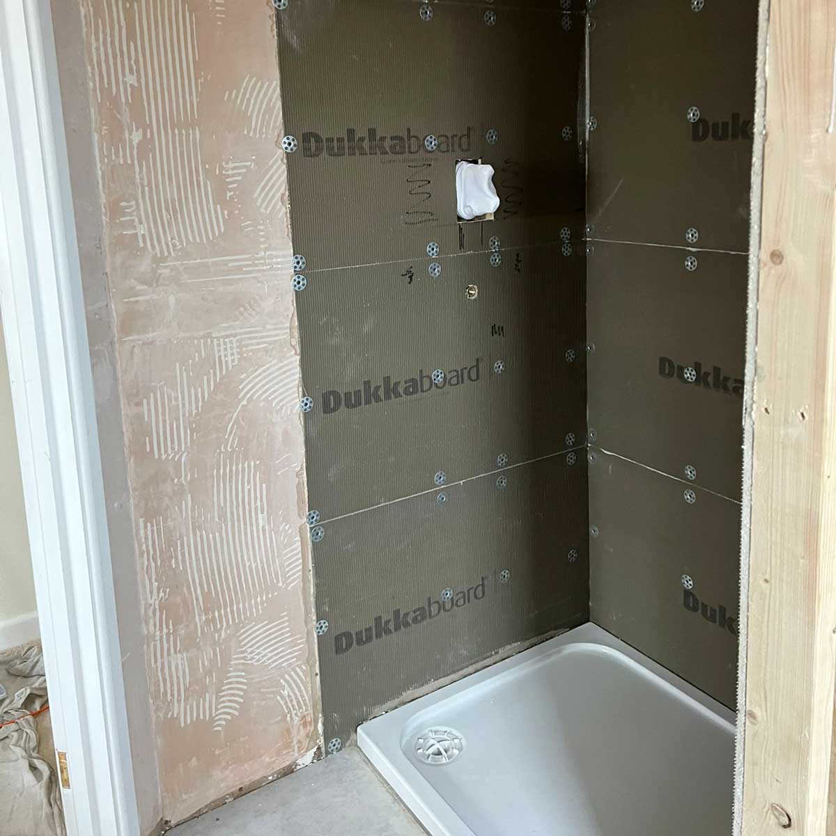 Creating the new enlarged shower for a customer in Lytchett Matravers