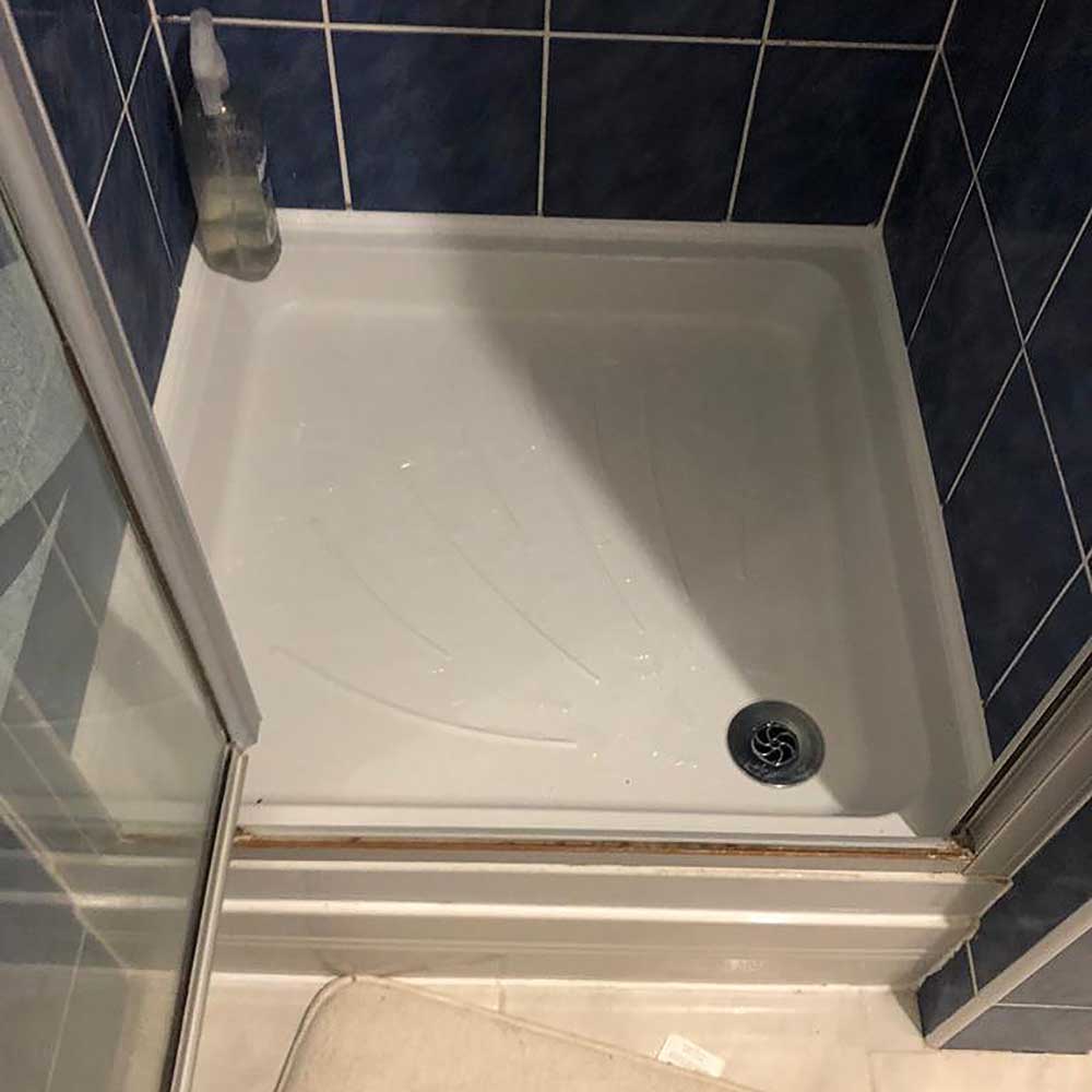The Room H2o team removed this small 800mm shower tray and created space for a large 1100mm shower for a customer in Dorset